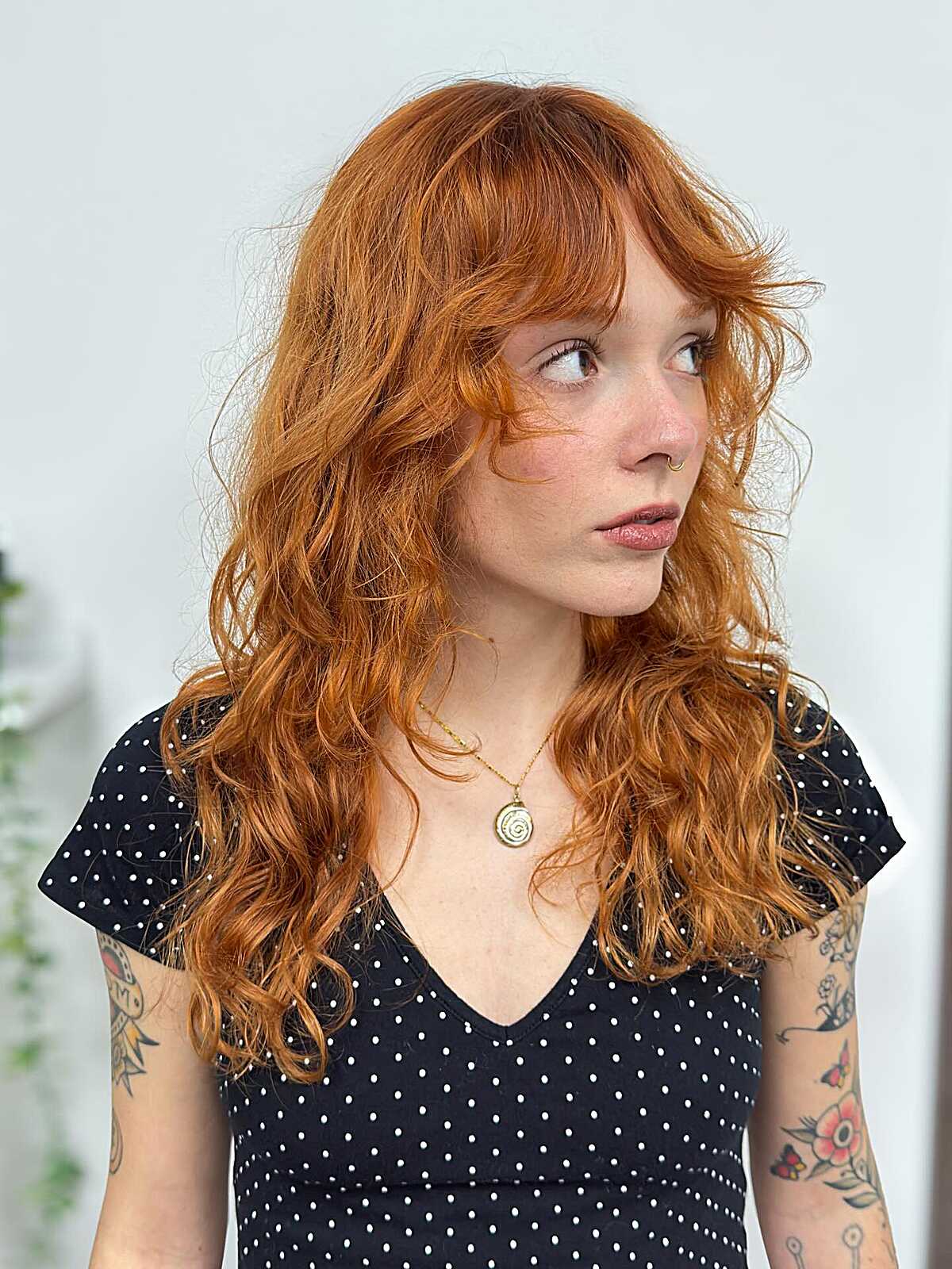 Bright copper long curly shag with wispy bangs
