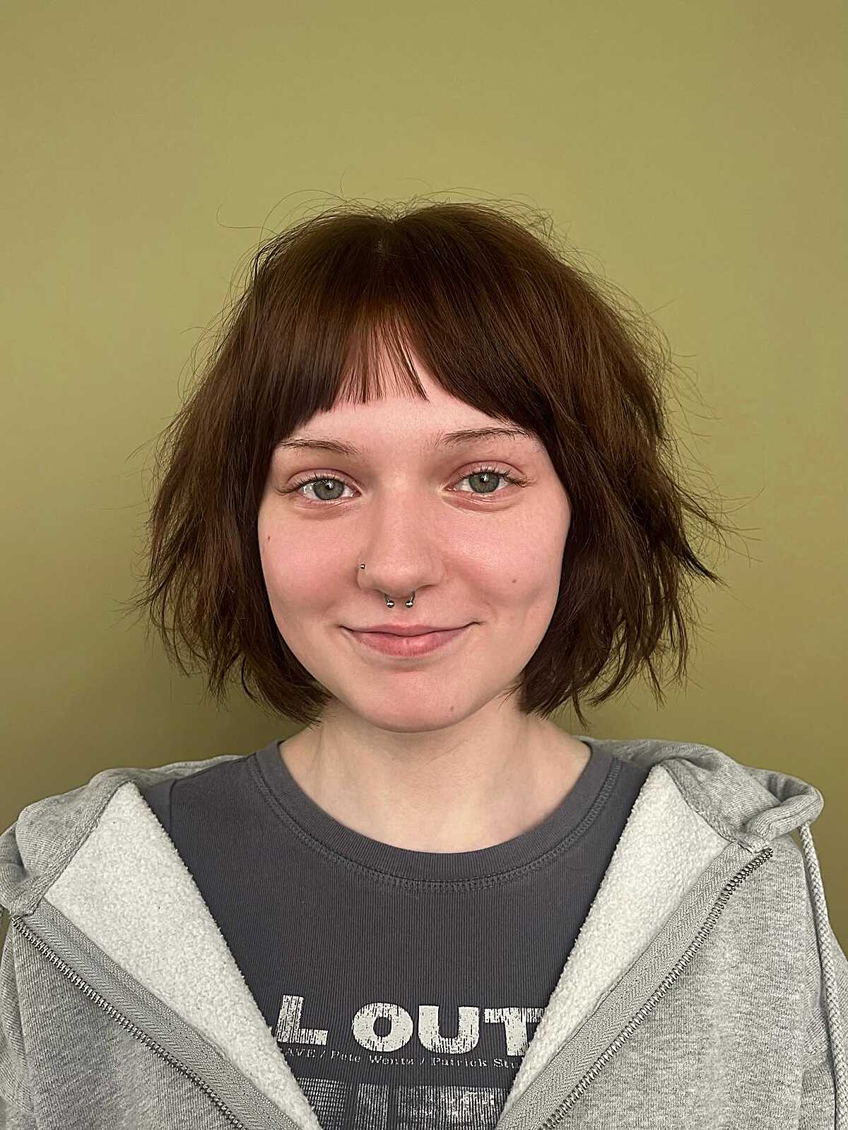 Short choppy brunette shag with micro bangs