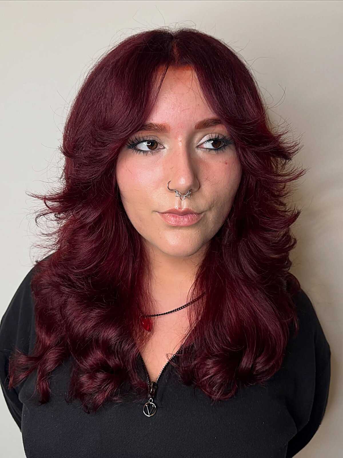 Long burgundy feathered shag with curled ends