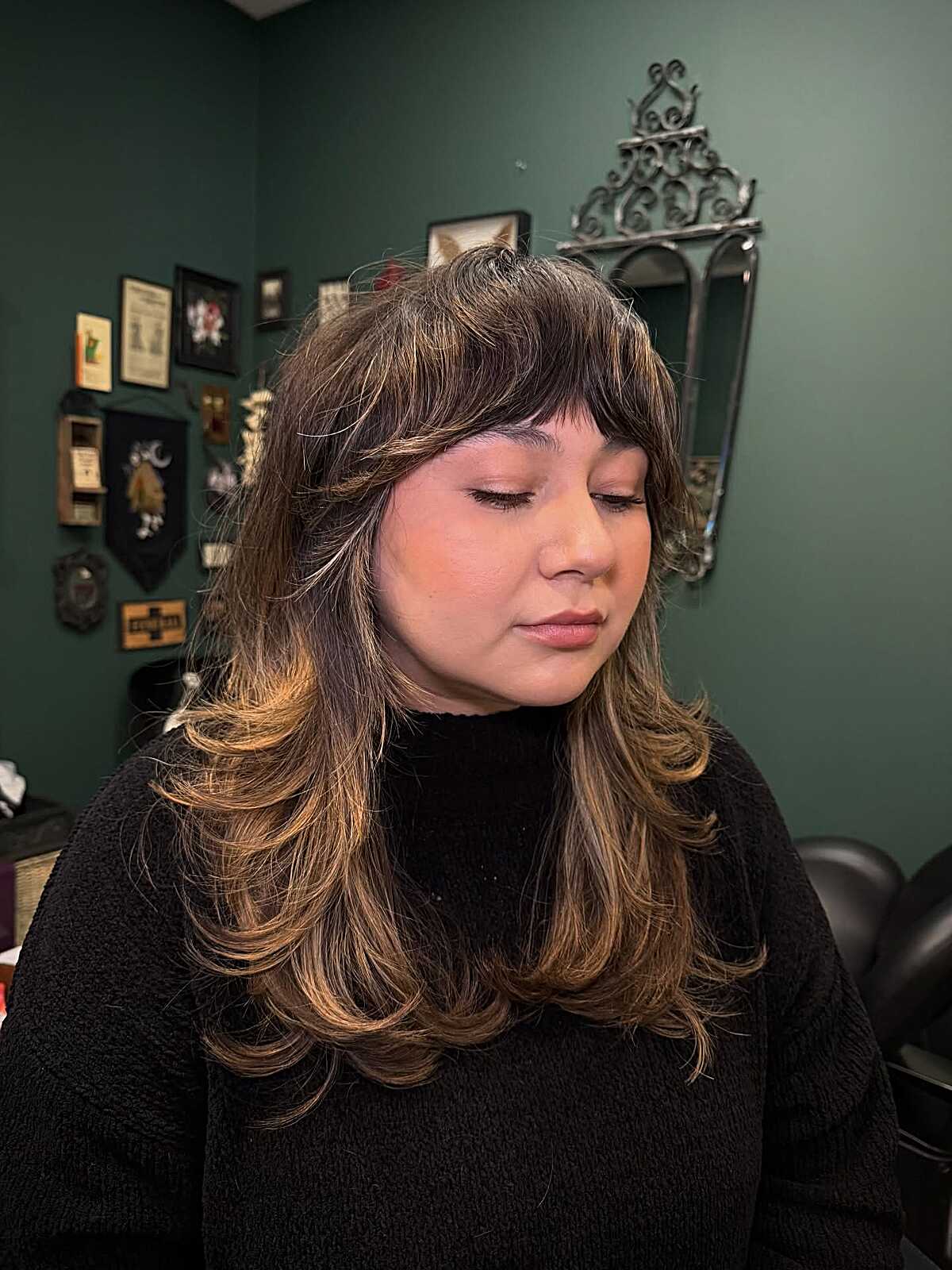 Long feathered shag with caramel highlights and bangs