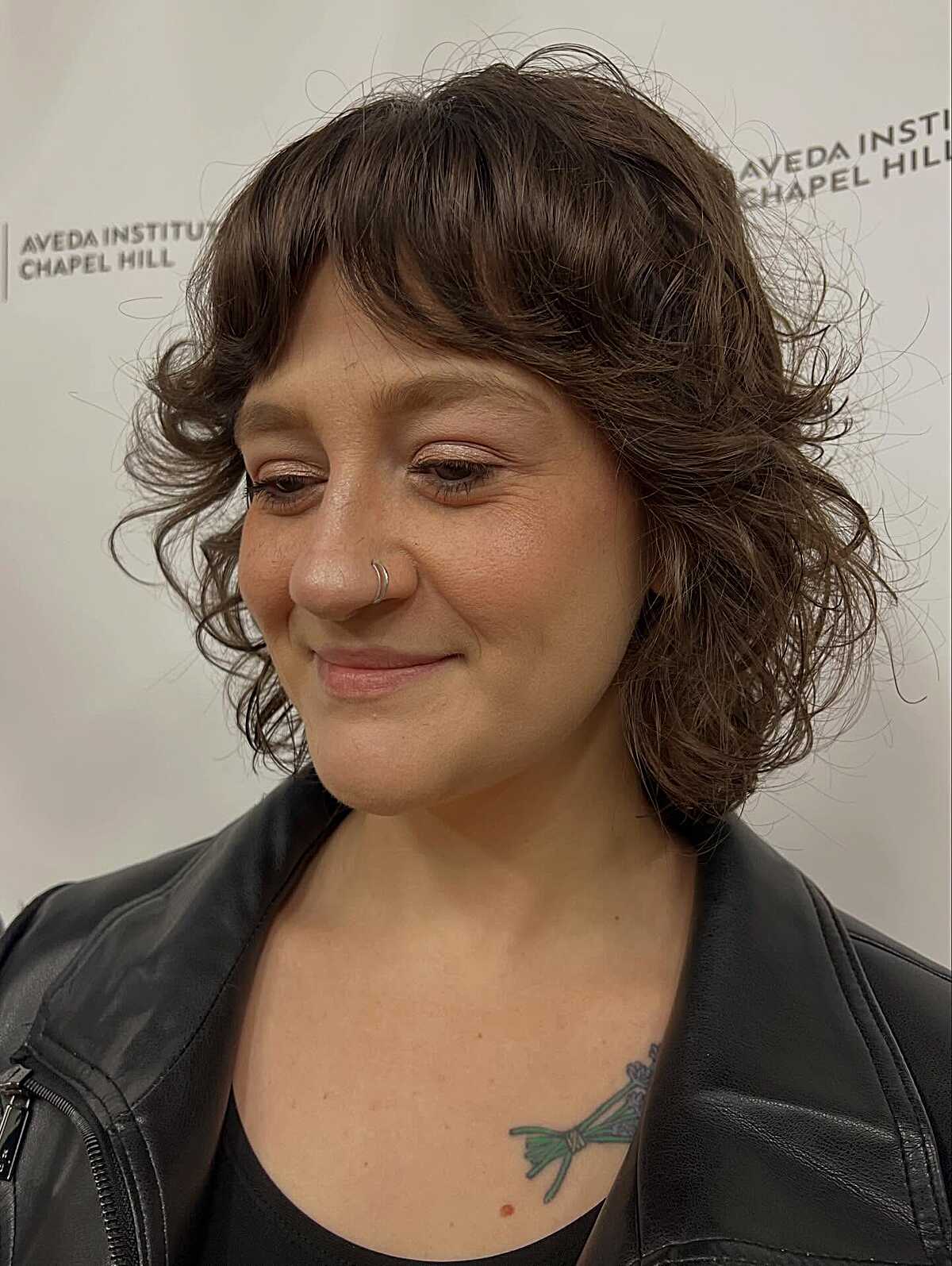 Short curly brunette feathered shag bob