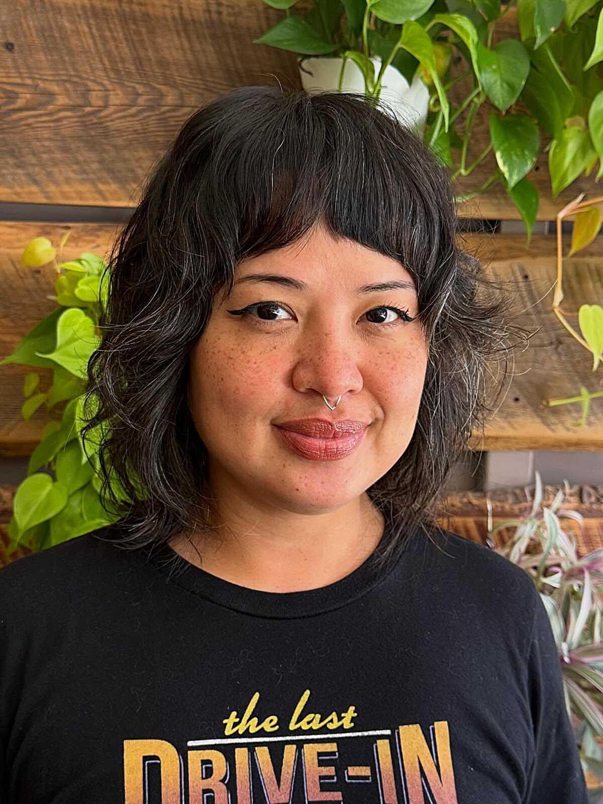 Dark wavy bob shag with choppy wispy bangs