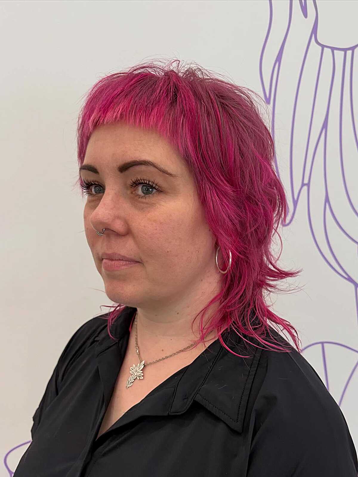 Hot pink feathered shag bob with choppy bangs