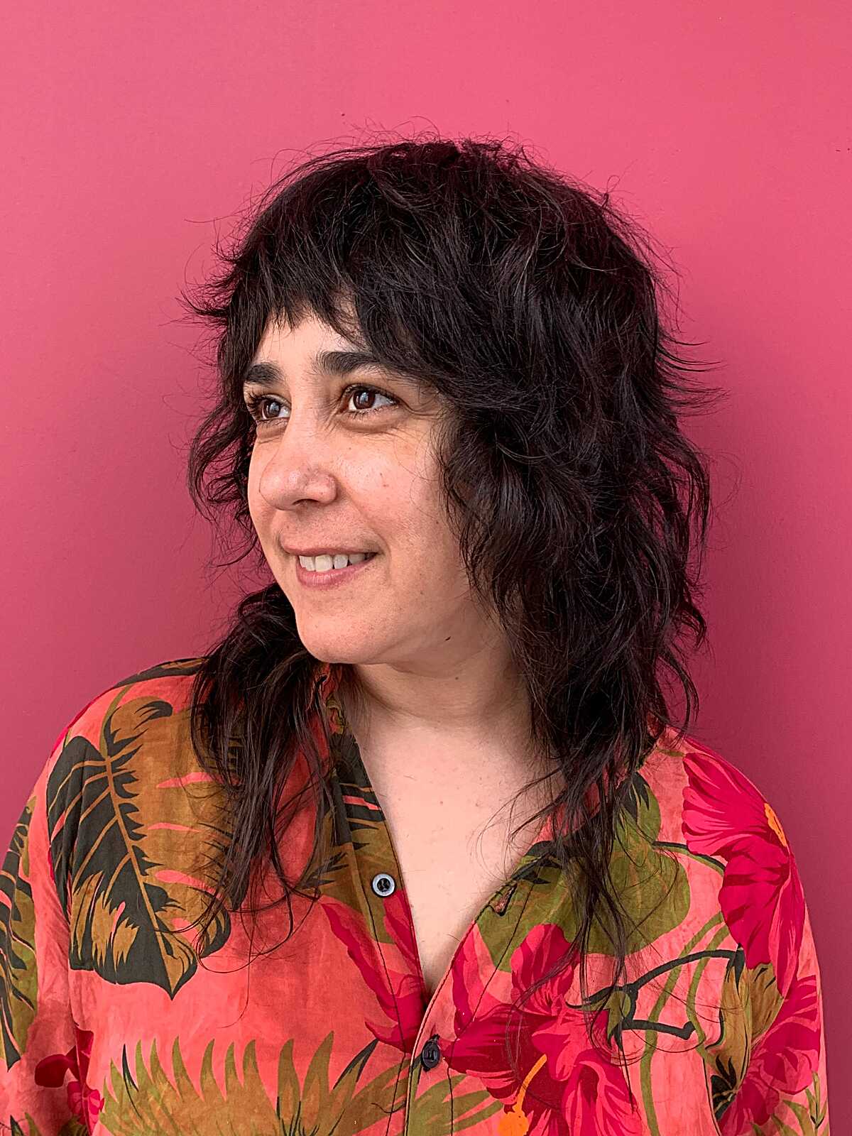 Black wavy feathered shag with full bangs