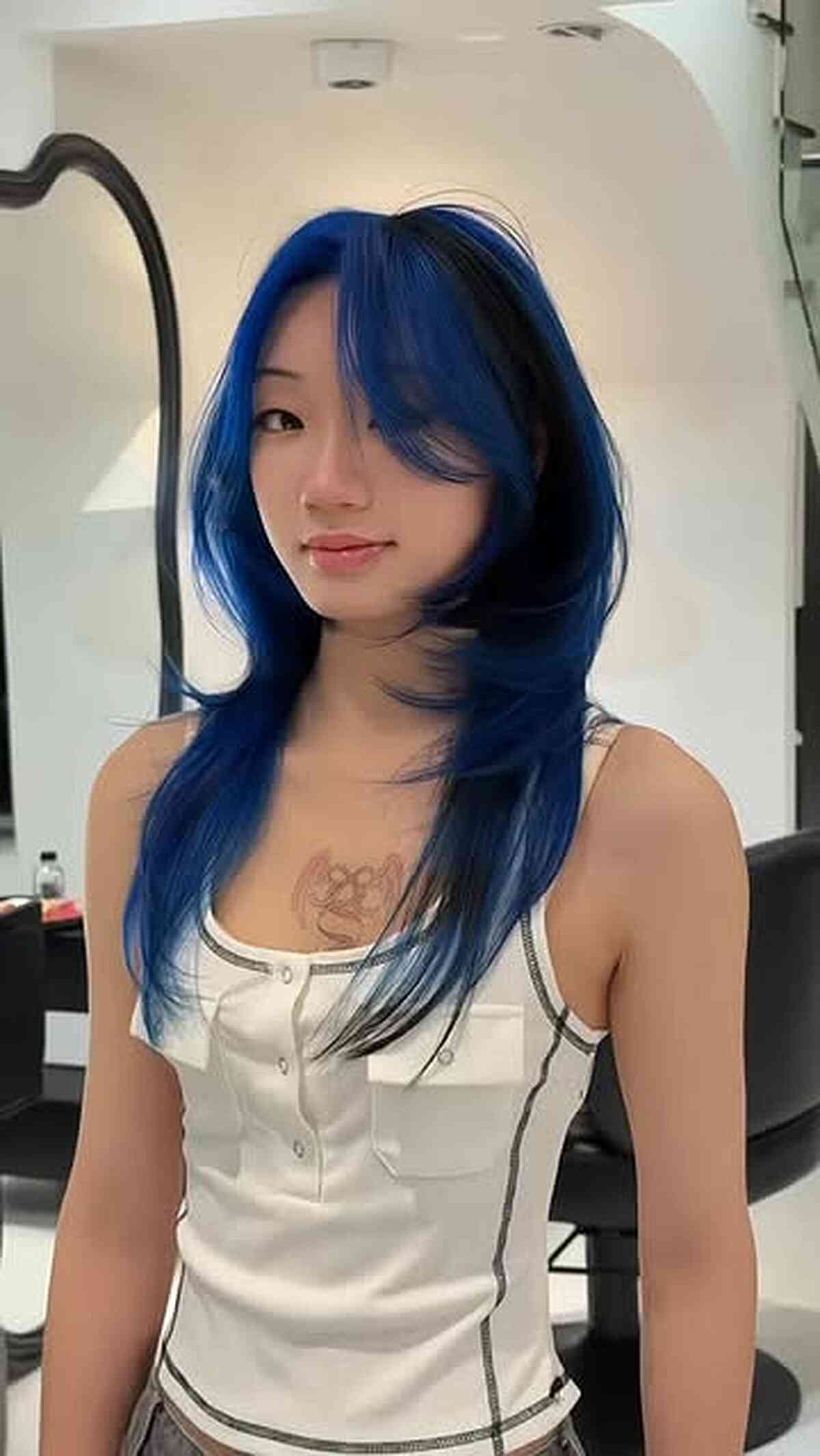 Vibrant Blue Long Layered Hairstyle