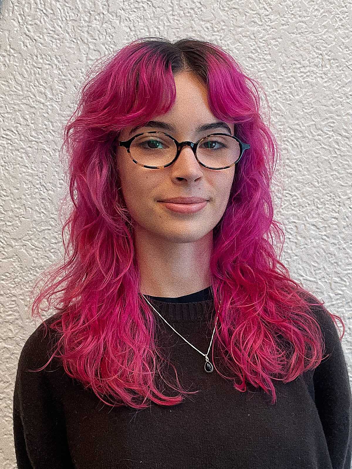 Vivid magenta pink wavy shag with dark roots