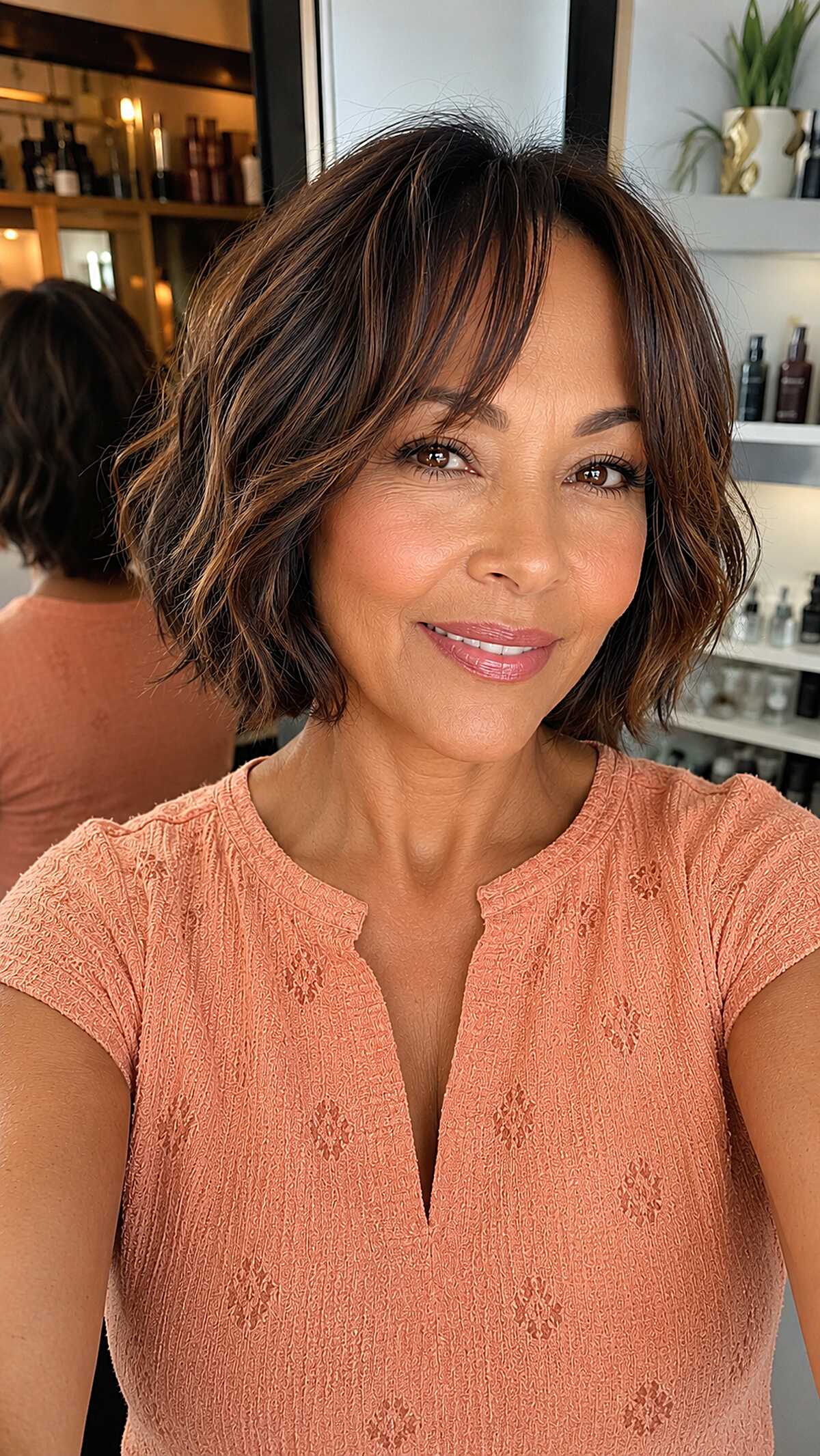 Dark chocolate wavy bob with subtle highlights