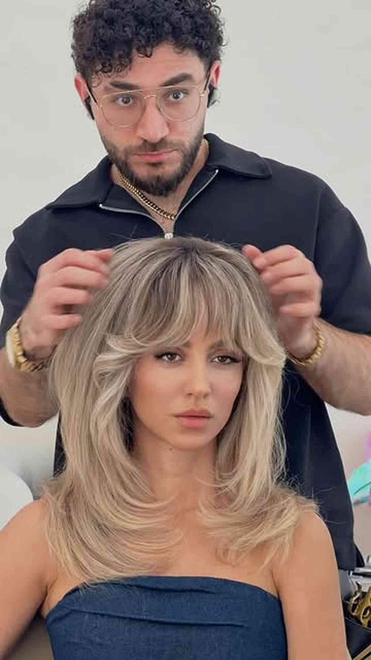 Layered Medium Length Blonde Hair with Soft Bangs