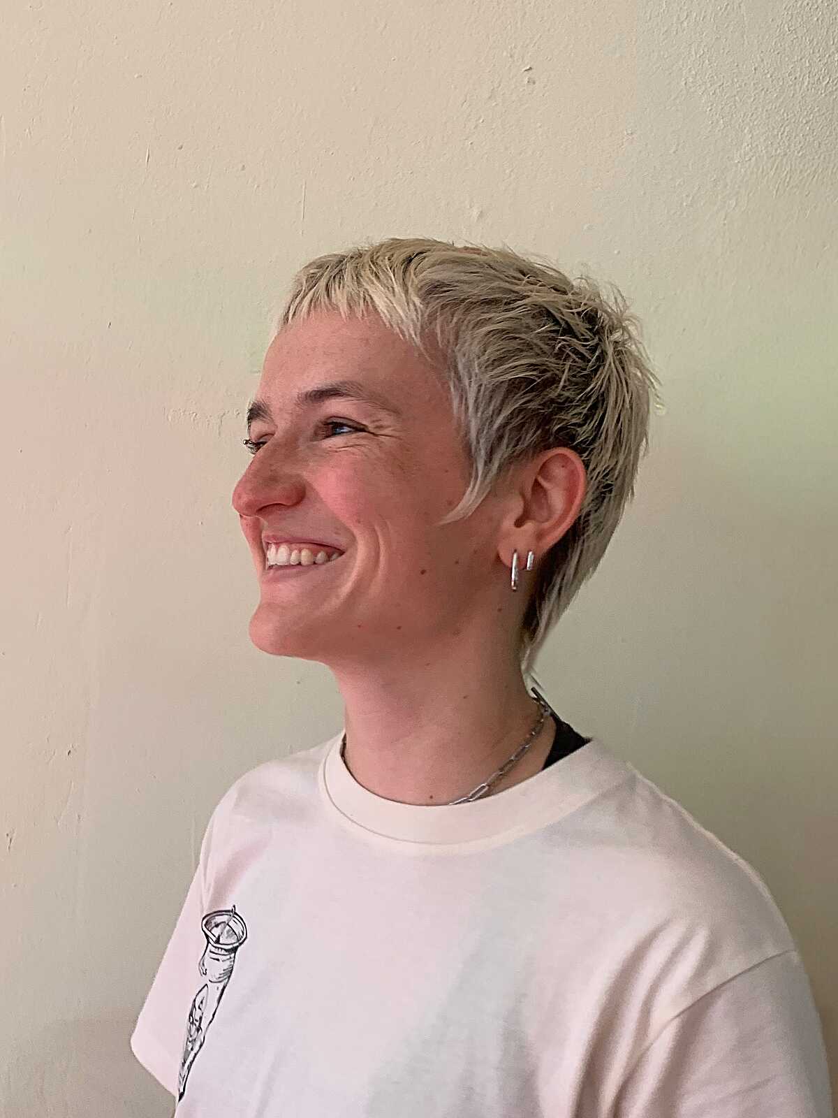 Ash Blonde Close-Cropped Pixie Shag with Razored Piecy Texture