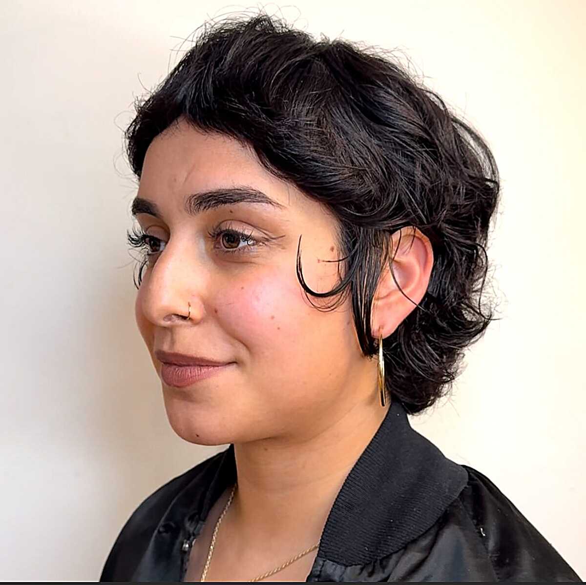 Black Wavy Pixie Shag with Curled Sideburn Detail
