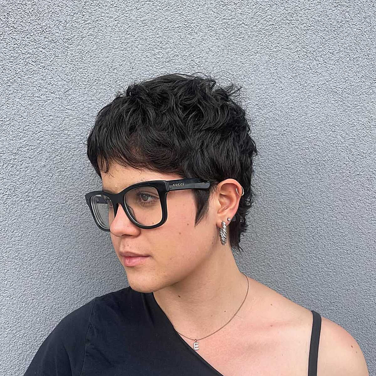 Jet Black Wavy Pixie Shag with Textured Crown and Tapered Sideburn Wisps