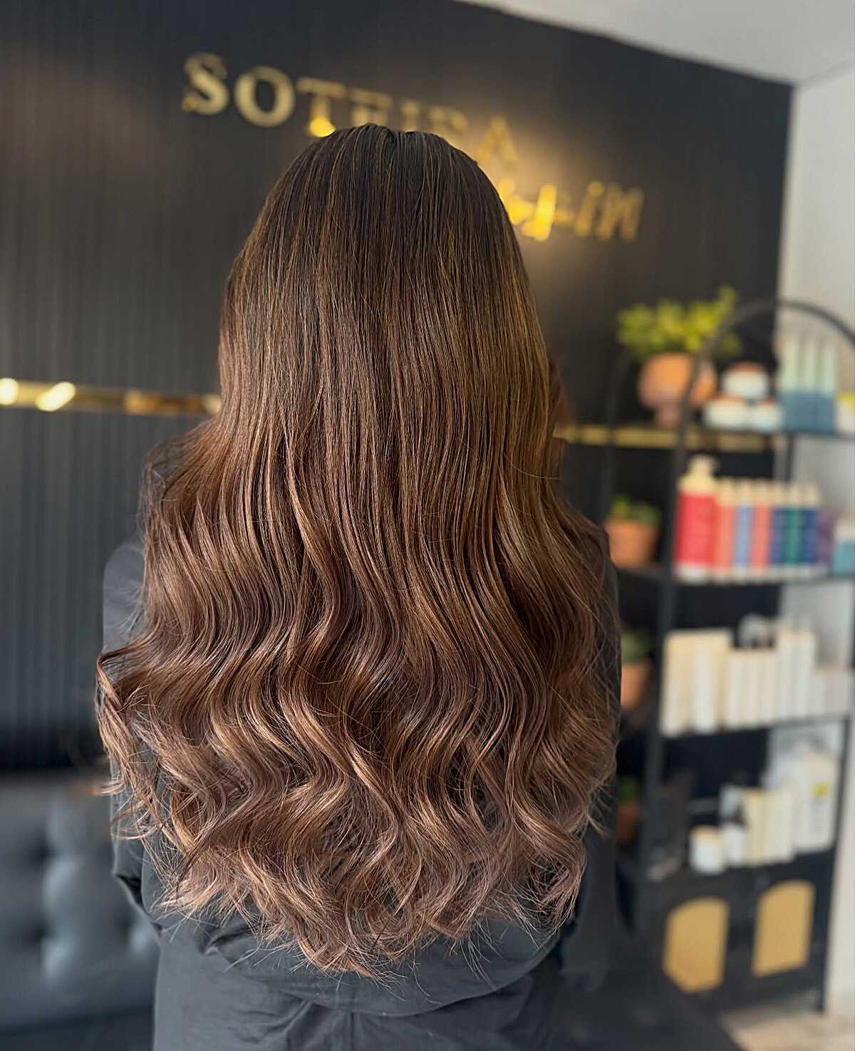 Lived-In Mocha Balayage on Long, Thick Hair with Soft Wave Styling
