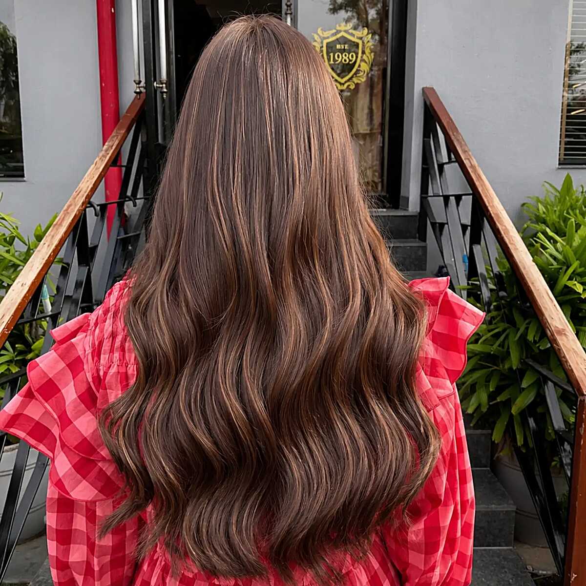 Subtle Mocha Ribbons Through Dense, Long Hair