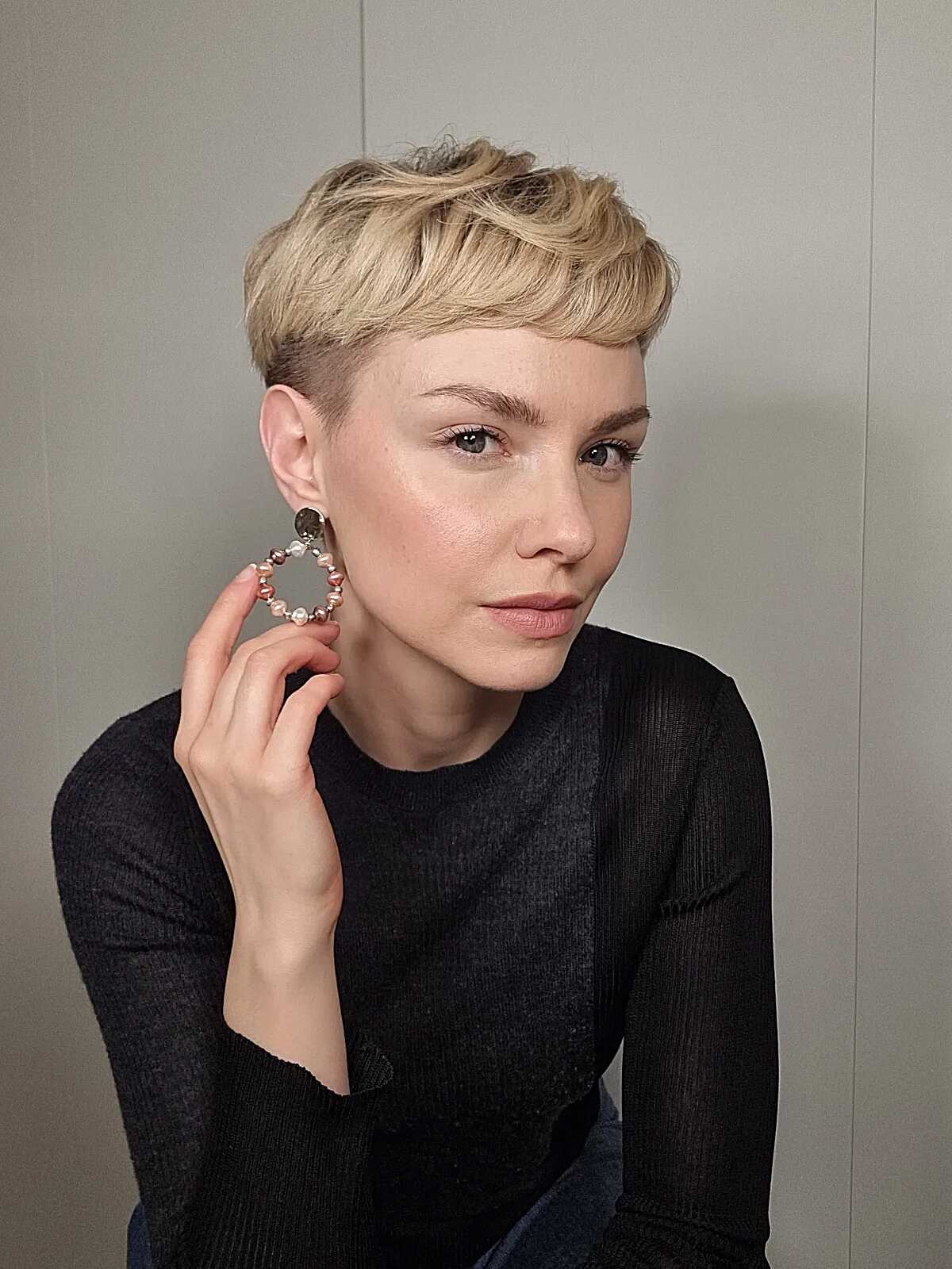 Warm Blonde Cropped Pixie with Tapered Sides and Layered Crown
