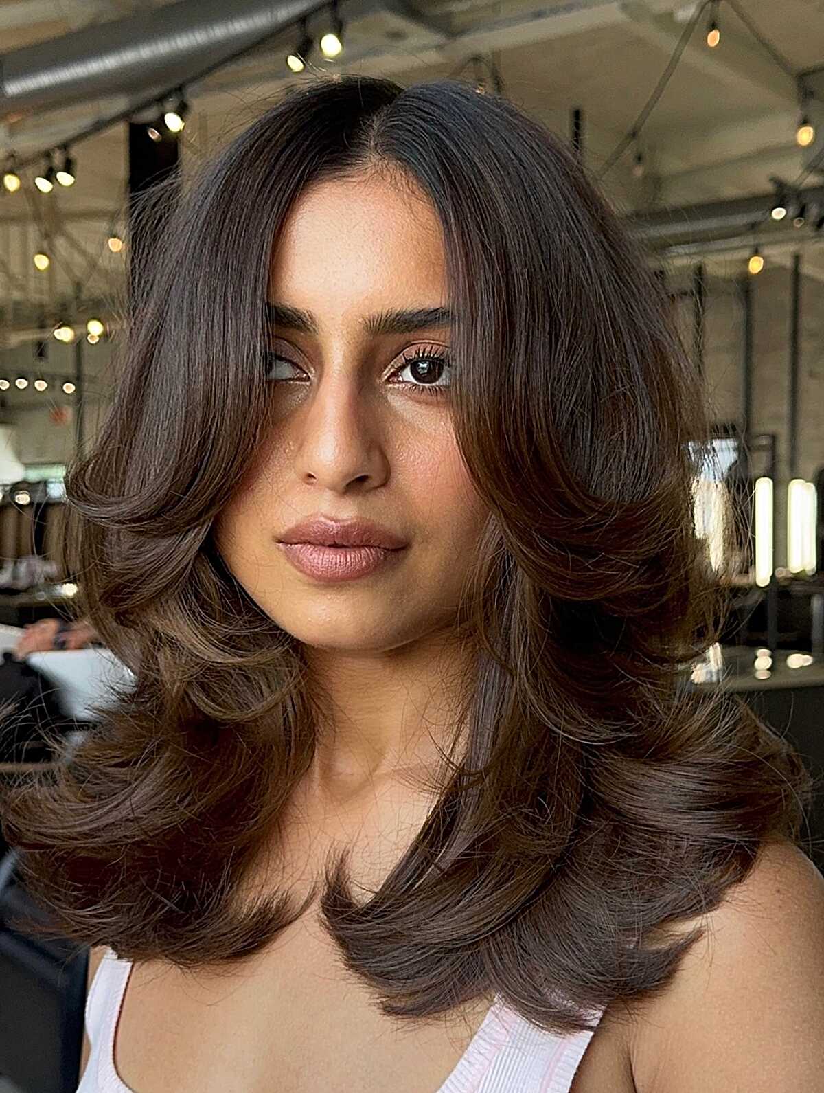 Blow-Dried Brunette Layers With Big Curled Ends and Serious Volume