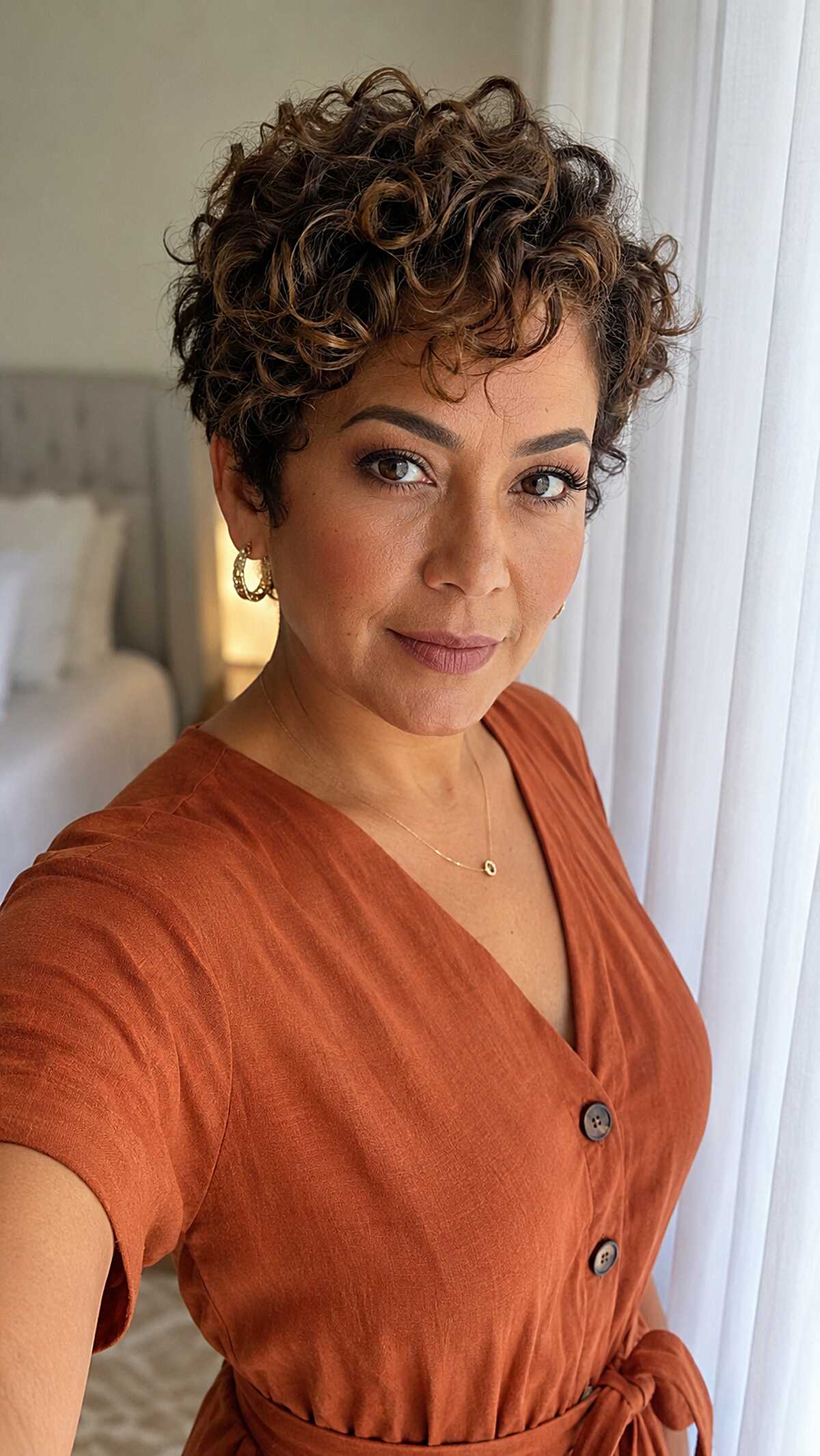 Cropped Curly Pixie with Warm Caramel Dimension