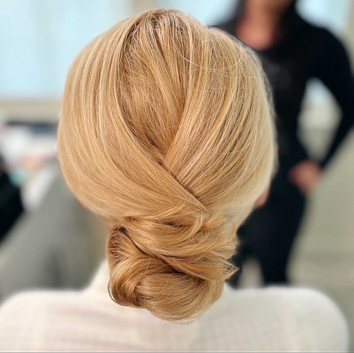 Crossed Low Chignon on Warm Blonde Hair