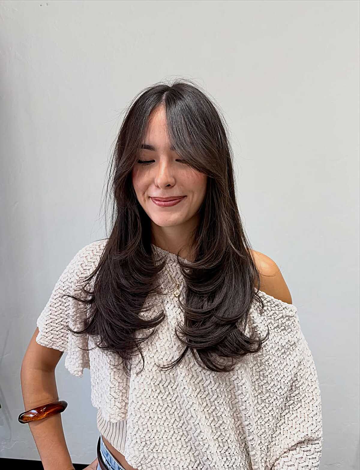 Dark Feathered Layers With Curtain Pieces and Round-Brushed Ends