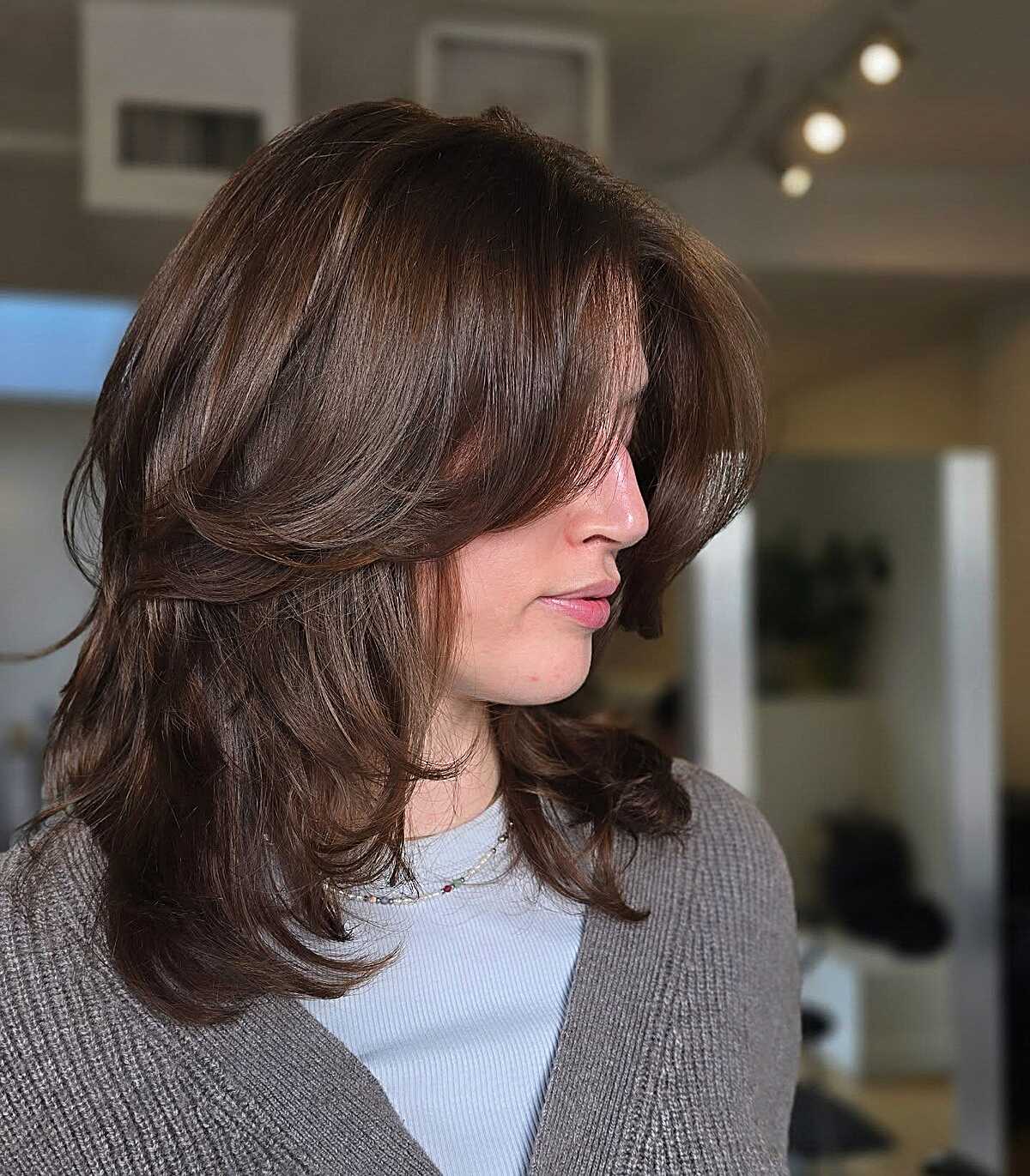 Rich Chestnut Layers With a Curtain Fringe That Does the Heavy Lifting
