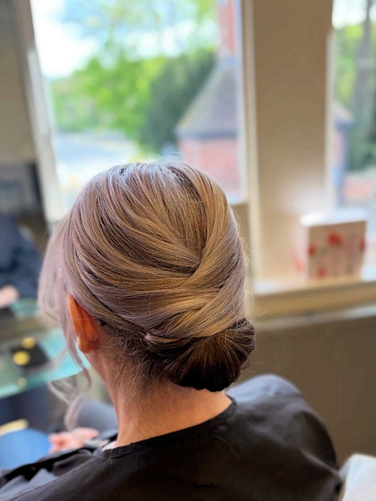 Smooth Rolled Chignon on Fine Dark Blonde Hair