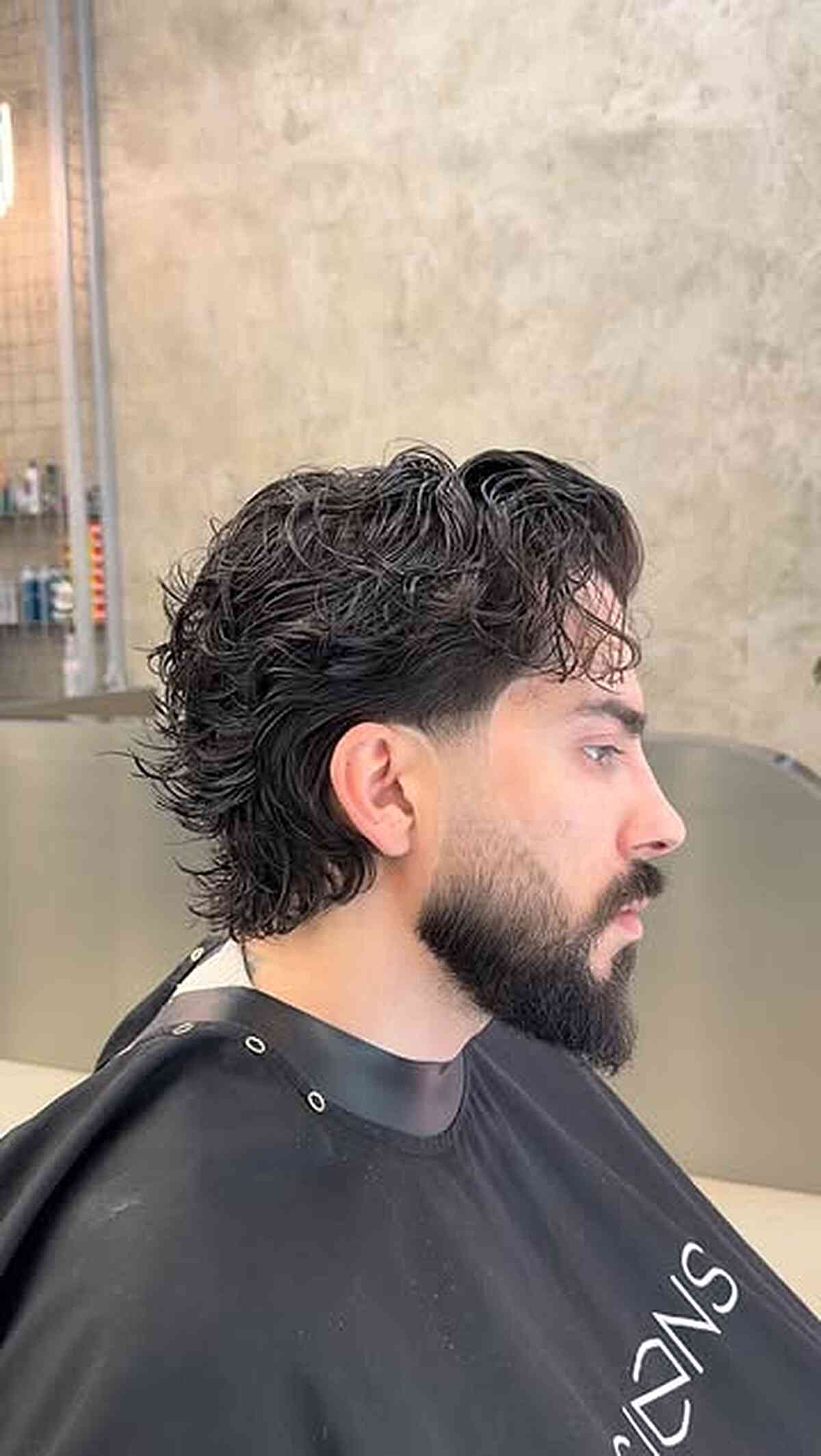 Trendy Wavy Mullet with Tapered Sides
