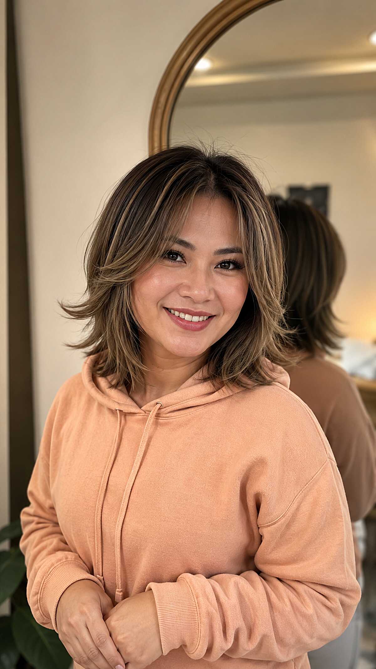 Chin-Length Brunette Butterfly Bob with Ash Blonde Balayage
