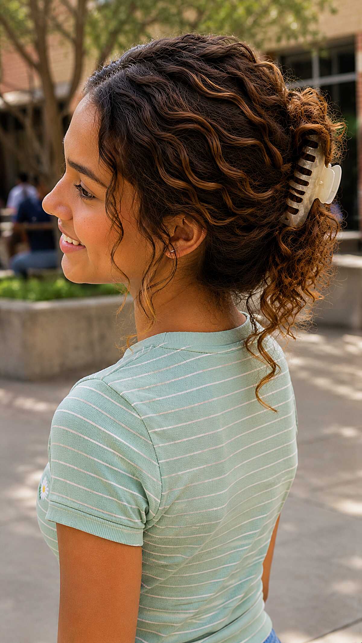 Claw Clip Twist on Medium Curls That Looks Intentional at Hour Six