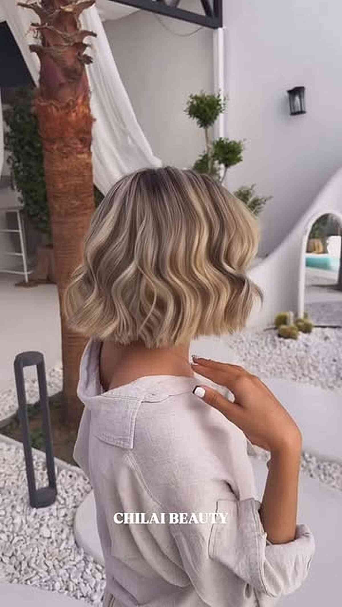 Stylish Blonde Balayage Bob with Soft Waves