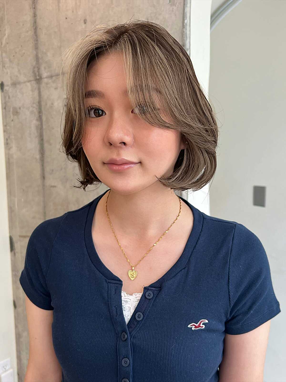 Ash Brown Chin-Length Bob With Feathered Ends and Curtain Wisps