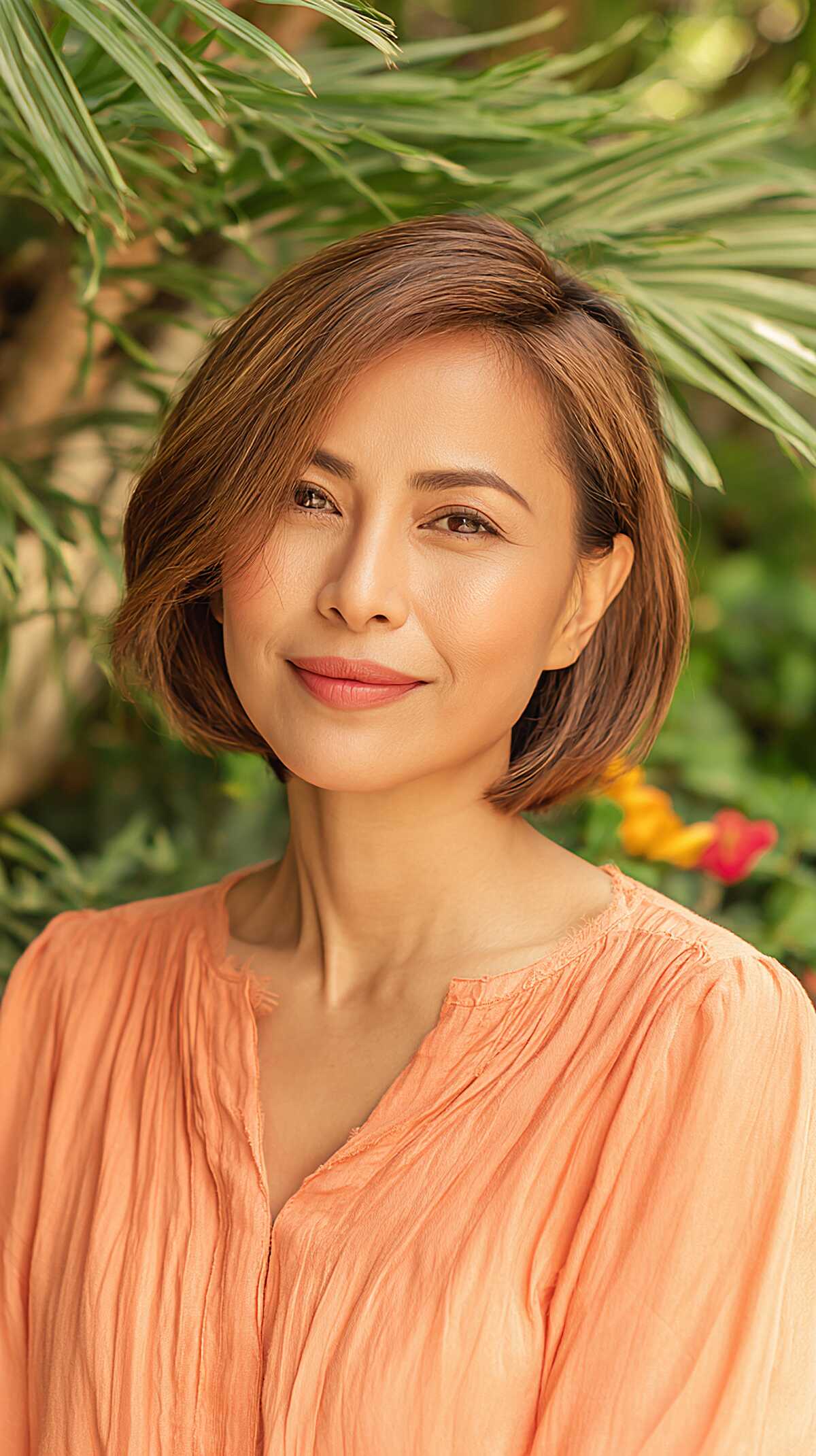 Chin-Length Rounded Bob with Soft Side Part