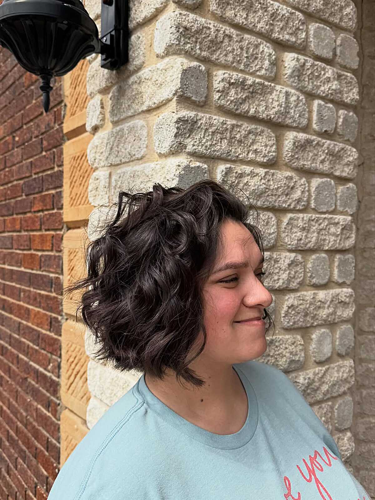 Curly Layered Bob With Volume Built Into the Crown