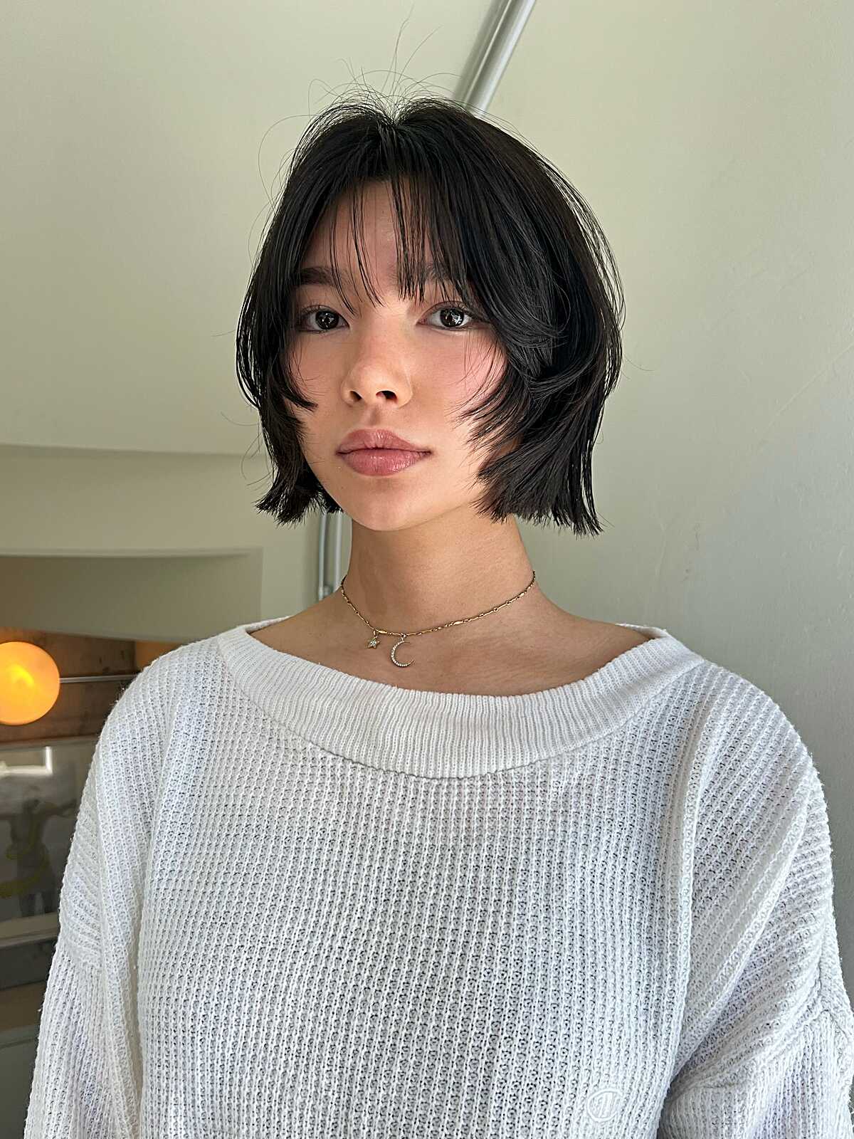 Razored Chin-Length Bob With Separated Fringe and Airy Texture
