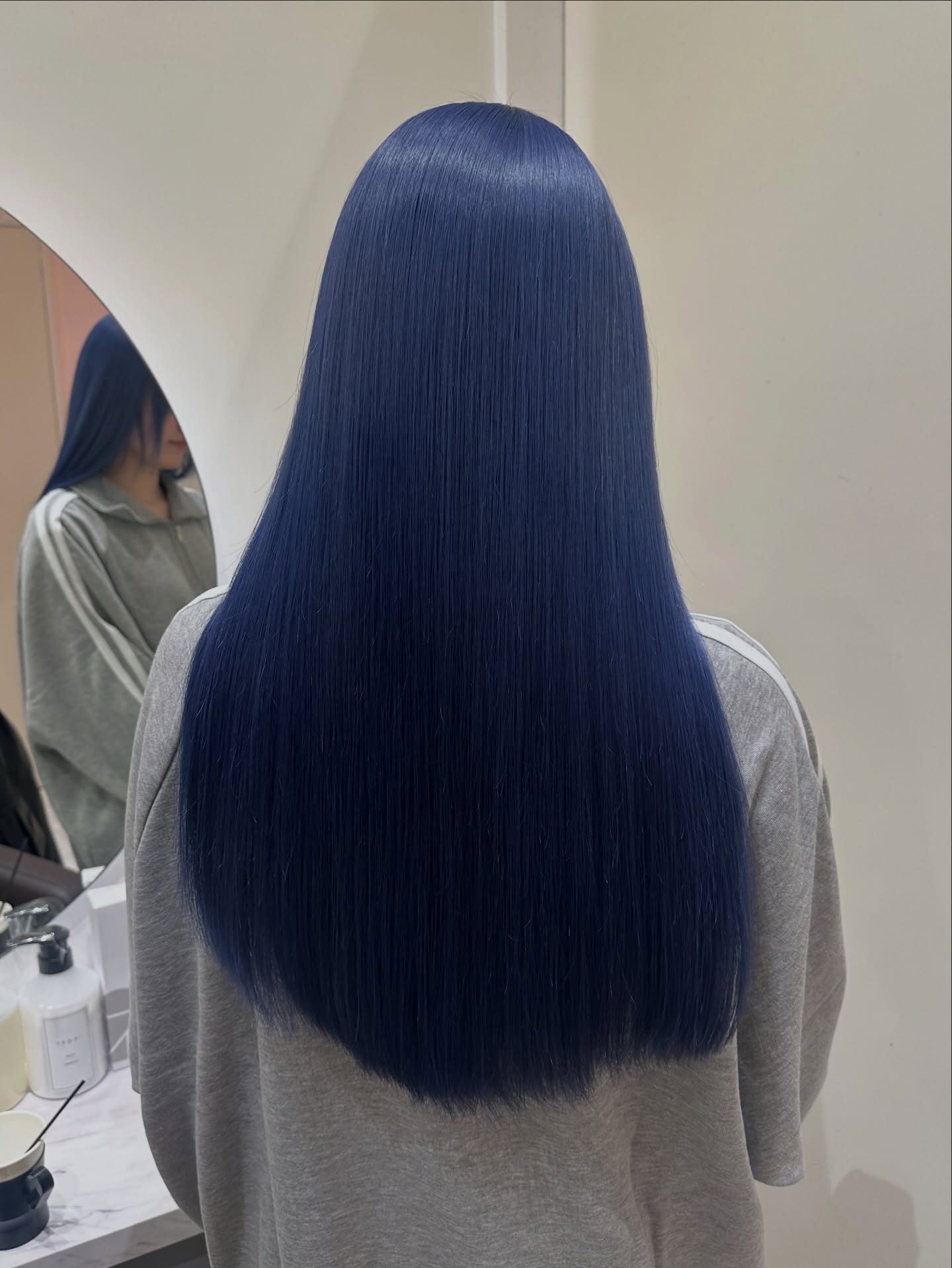 Sleek Navy Straight Hair with Subtle Shine