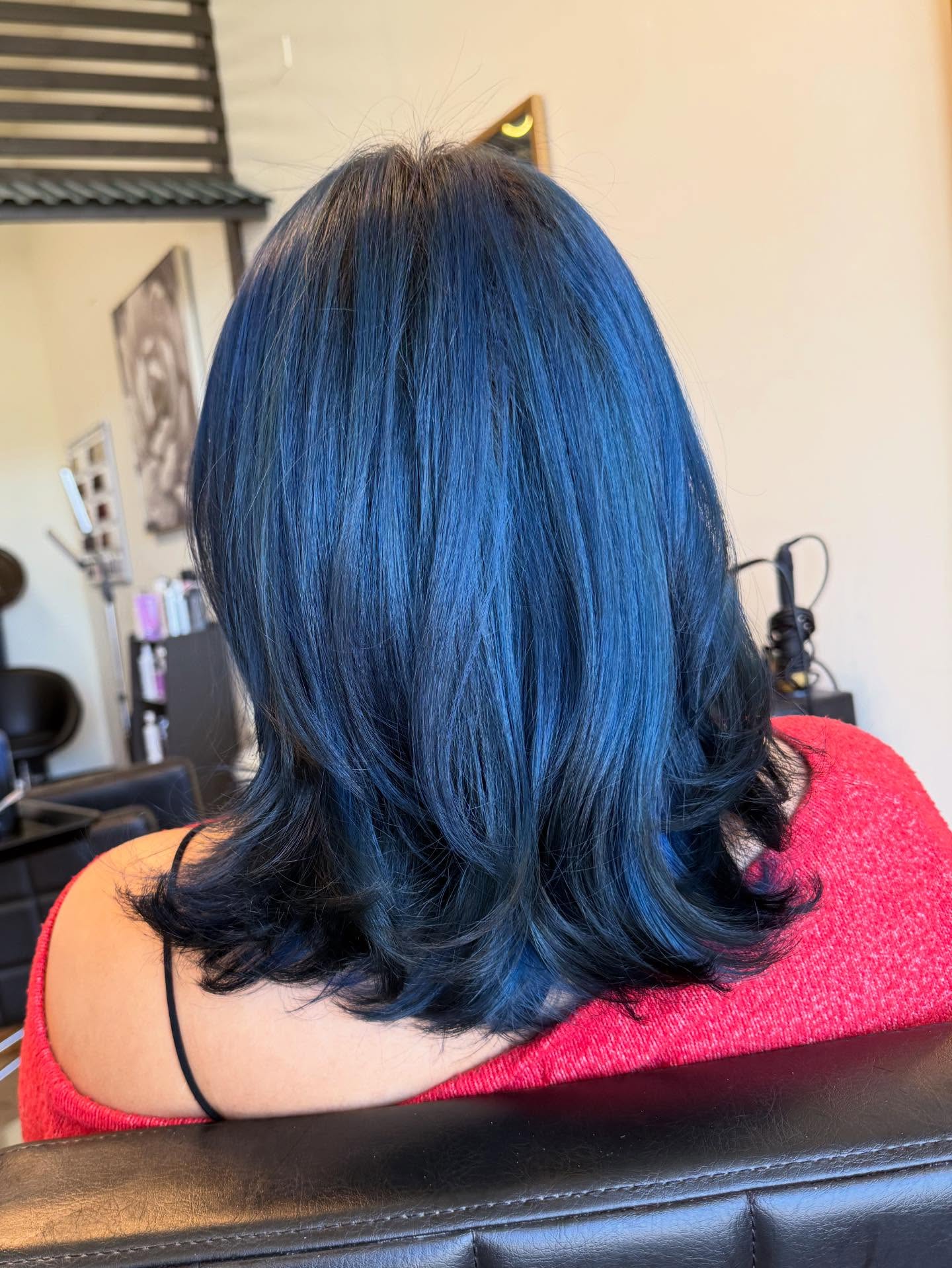 Chic Navy Mid-Length Layered Cut with Subtle Movement