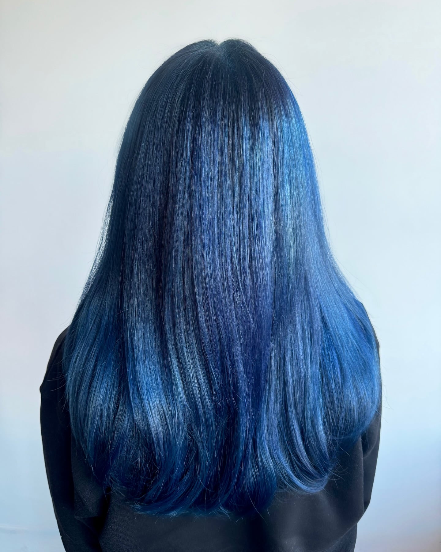 Radiant Navy Long Silky Hair with Subtle Depth