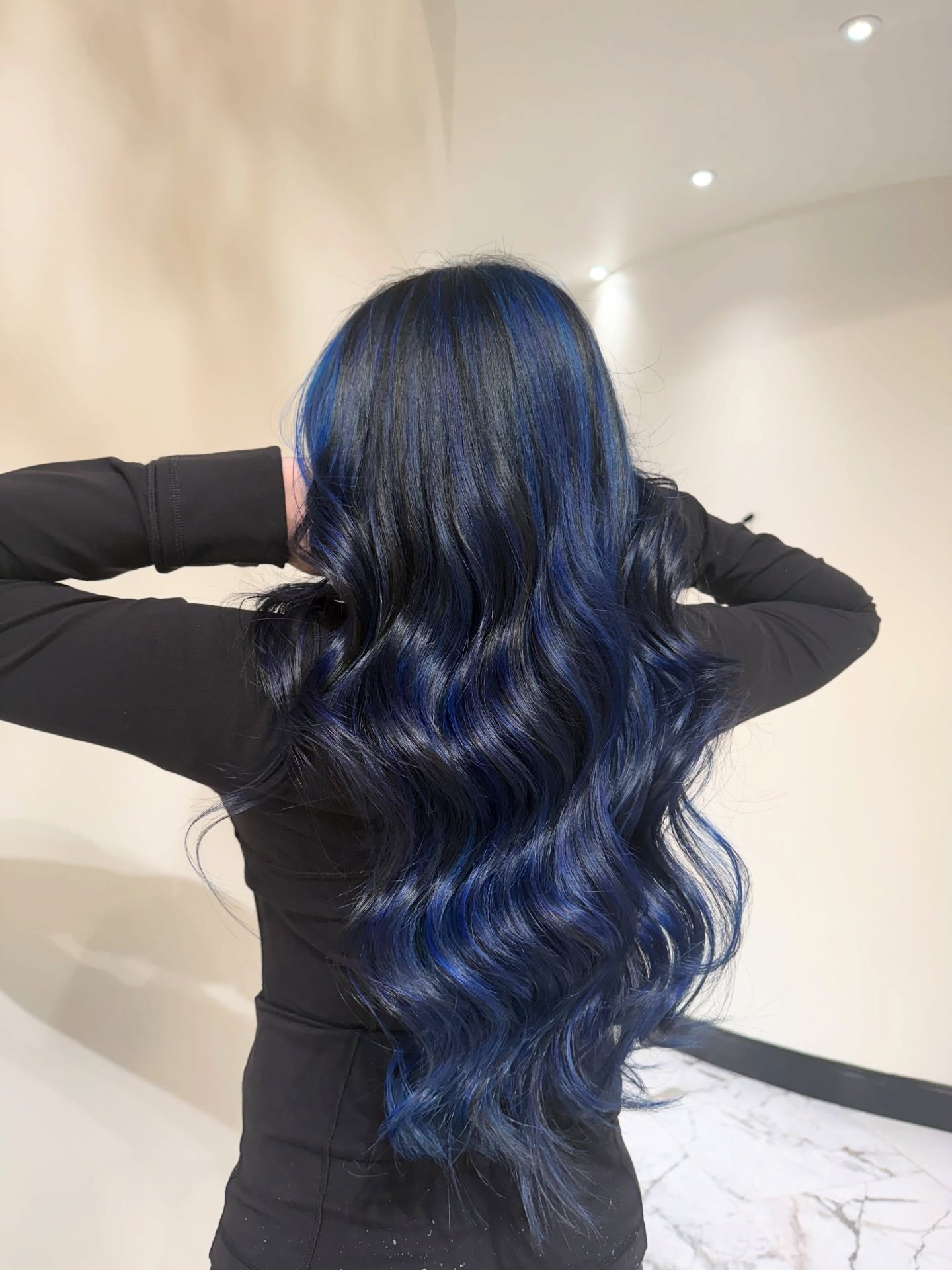 Stunning Navy Long Beachy Waves with Vibrant Highlights