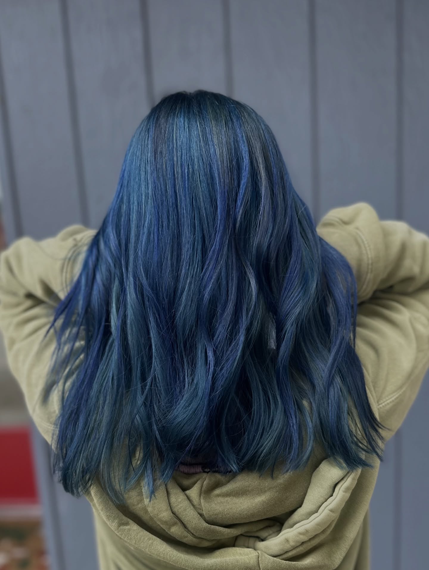 Trendy Navy Long Wavy Hair with Subtle Dimension